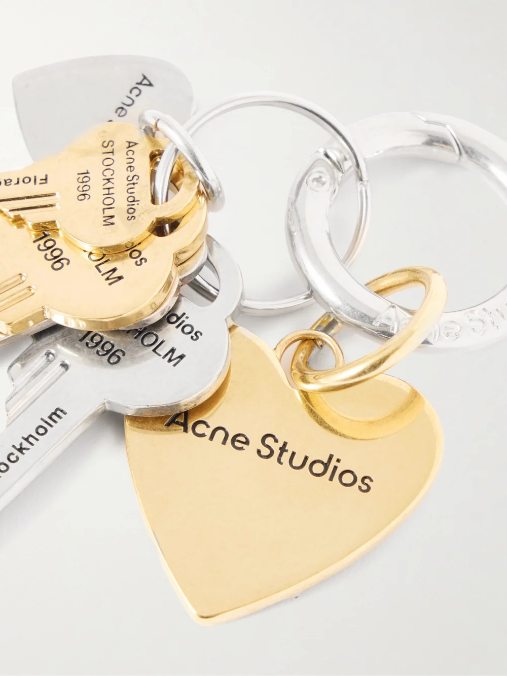 Close-up detail of the Acne Studios Silver- and Gold-tone Keyring