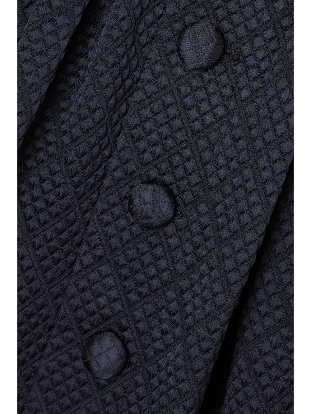 Close-up detail of the Adam Lippes Matelassé Wool-blend Midi Skirt