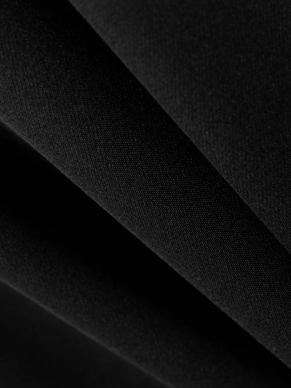 Close-up detail of the Adam Lippes Silk-charmeuse Gown