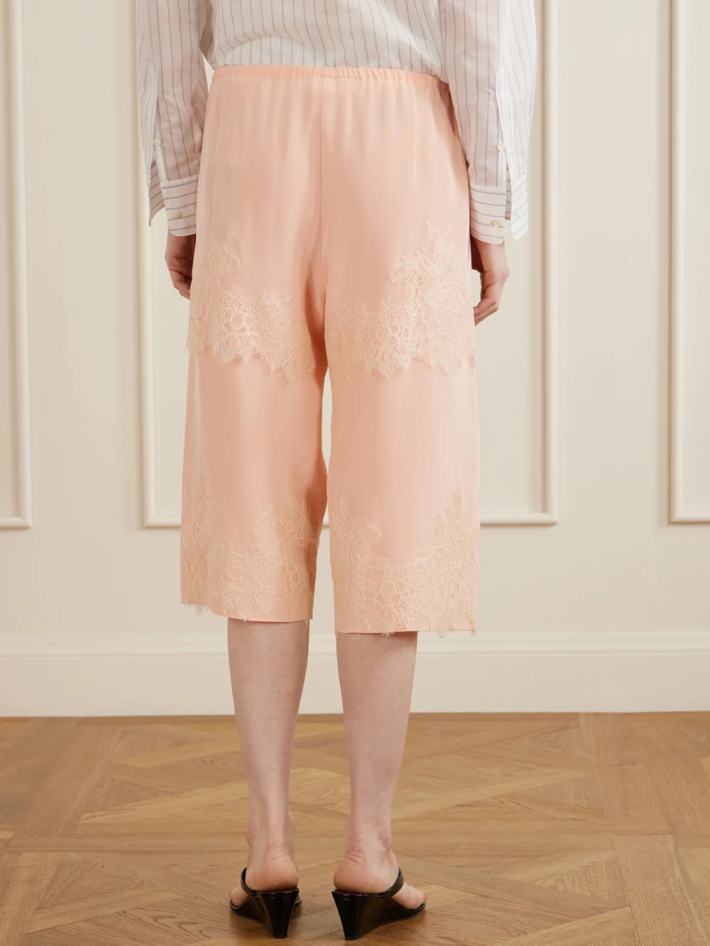Back view of the Aflalo Auden Lace-trimmed Silk-satin Shorts