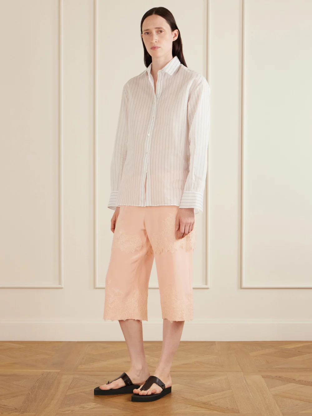 Aflalo Auden Lace-trimmed Silk-satin Shorts, worn by a model