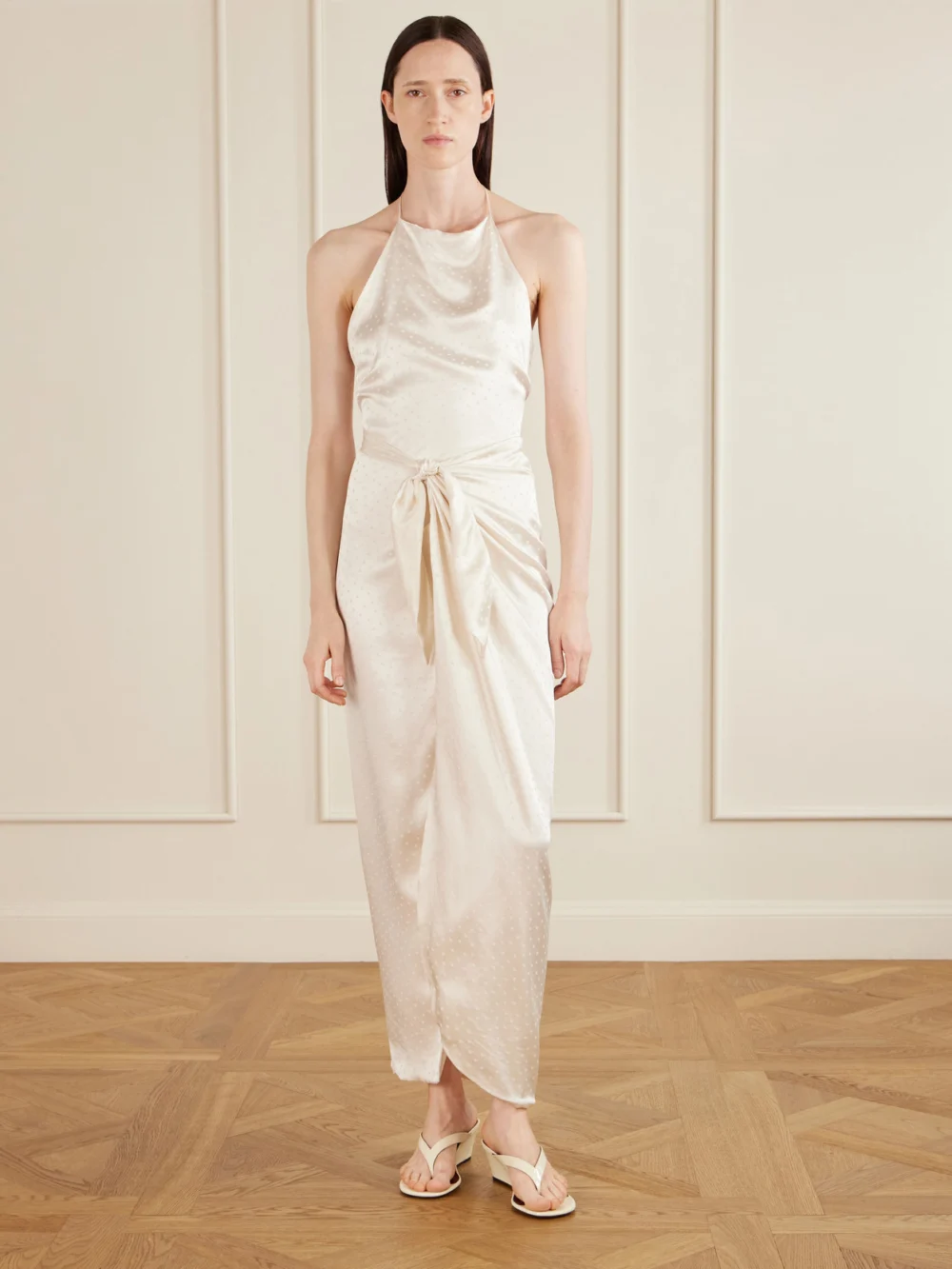 Aflalo Nourin Polka-dot Knotted Satin-jacquard Halterneck Maxi Dress, worn by a model