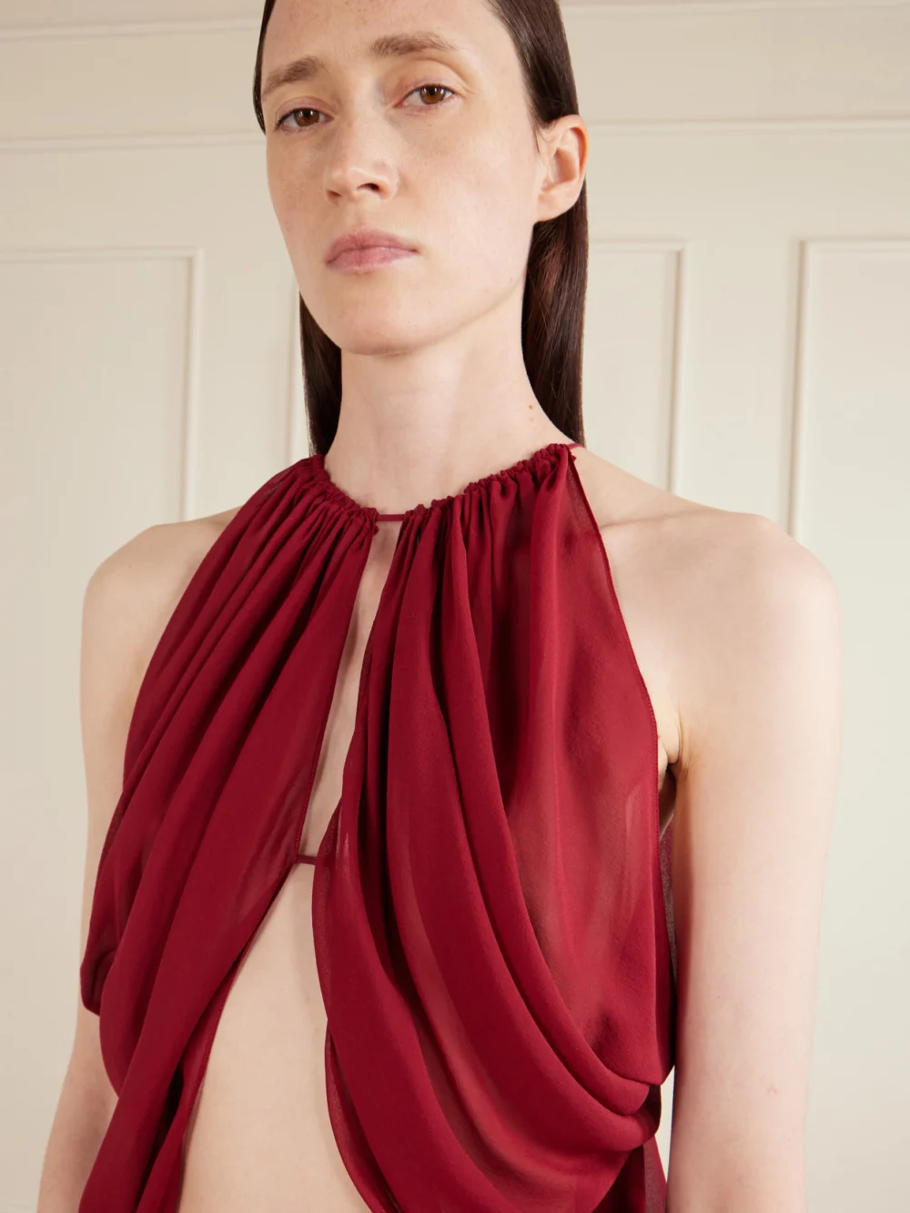 Close-up detail of the Aflalo Reysa Ruched Silk-crepe Top