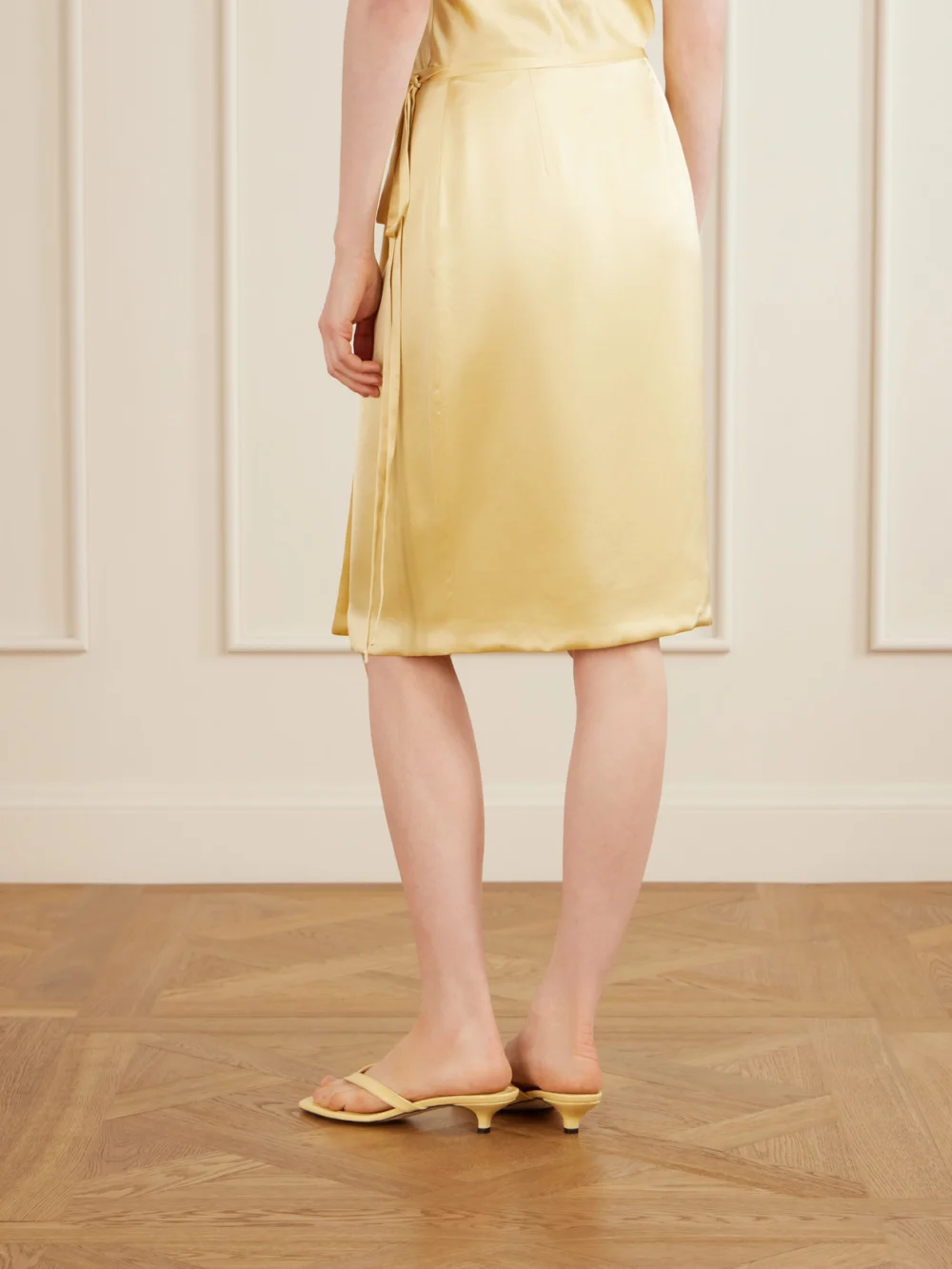 Back view of the Aflalo Rixa Satin Wrap Midi Skirt