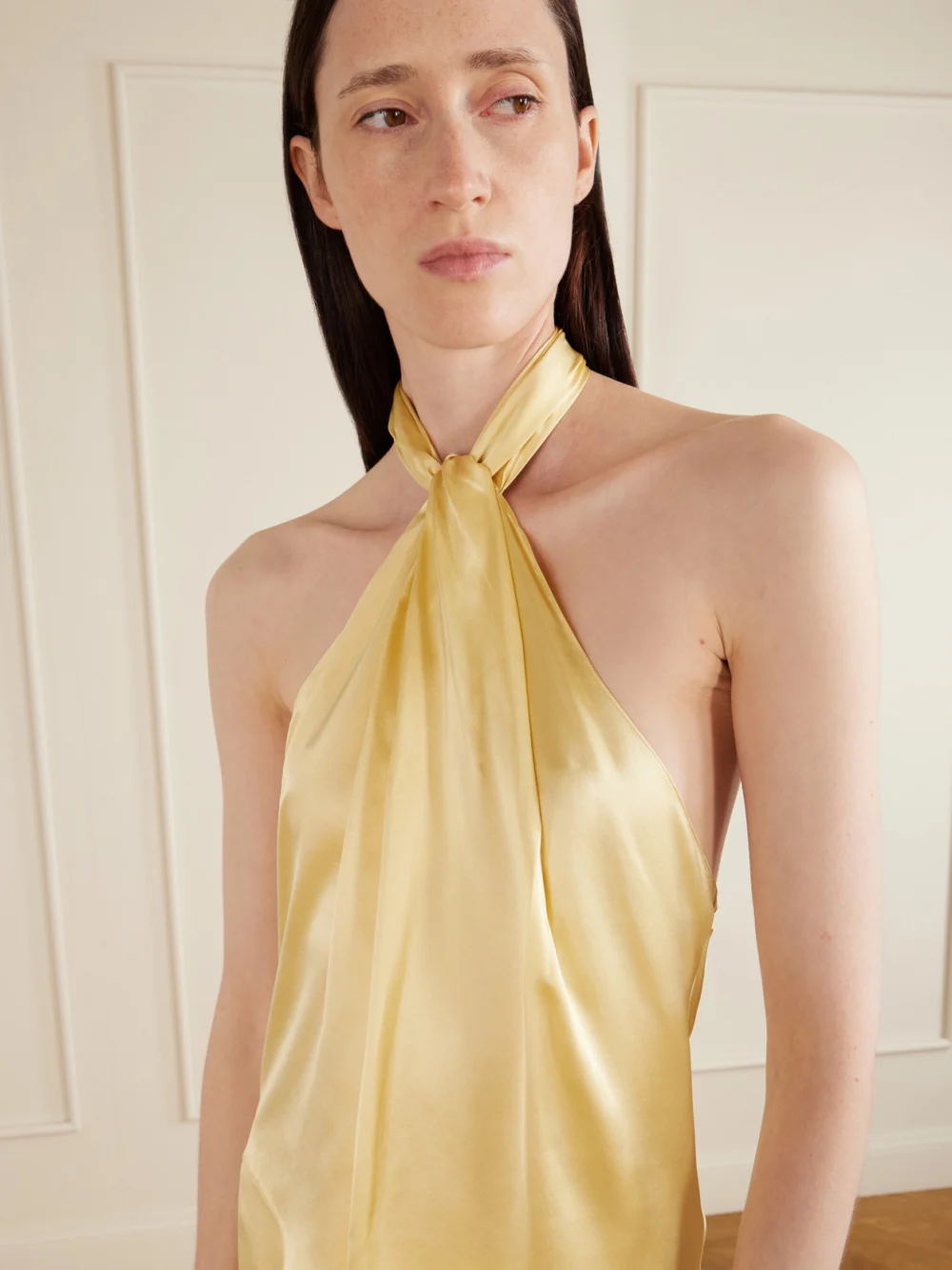 Close-up detail of the Aflalo Safira Silk-satin Halterneck Top