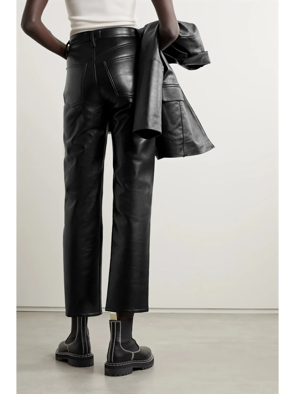 Back view of the Agolde 90s Pinch Waist Leather-blend Straight-leg Pants