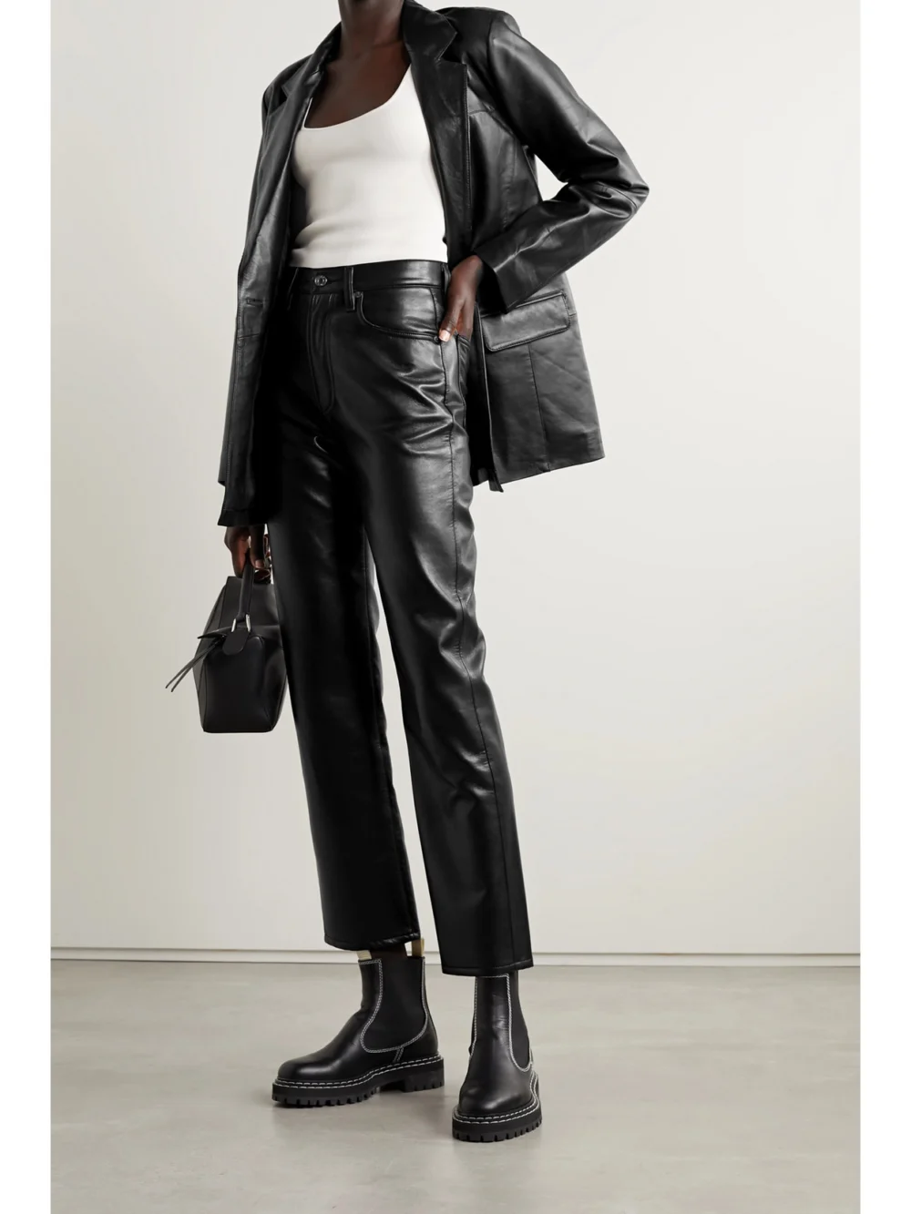 Agolde 90s Pinch Waist Leather-blend Straight-leg Pants, worn by a model