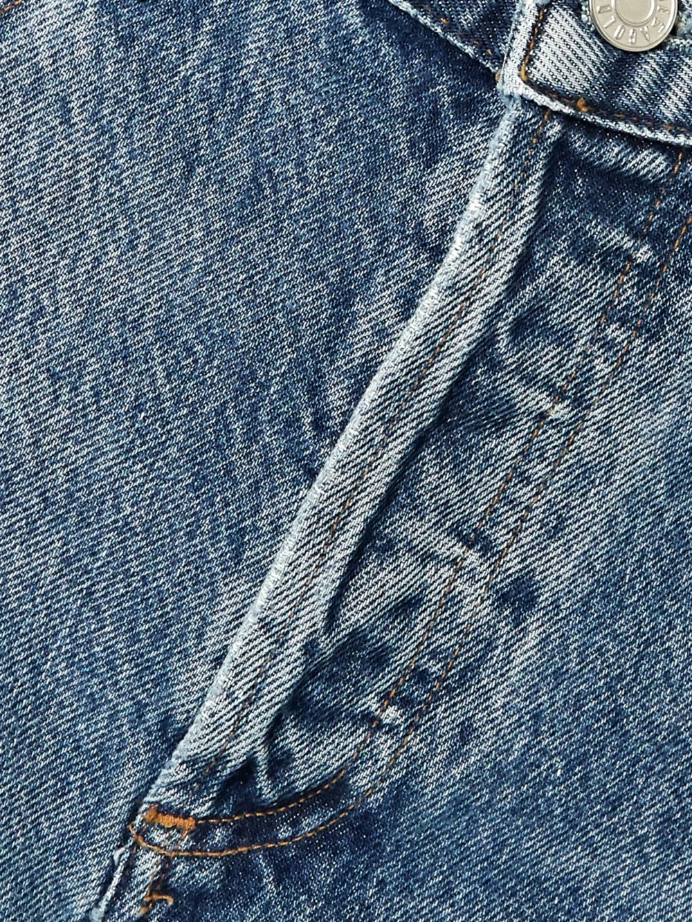 Close-up detail of the Agolde Carrie Denim Shorts