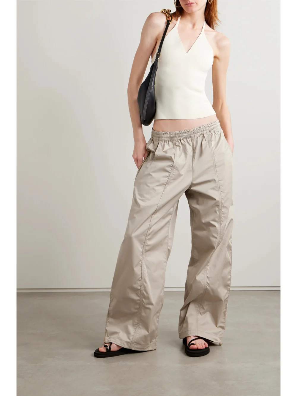 Agolde Dakota Cotton-poplin Track Pants, worn by a model