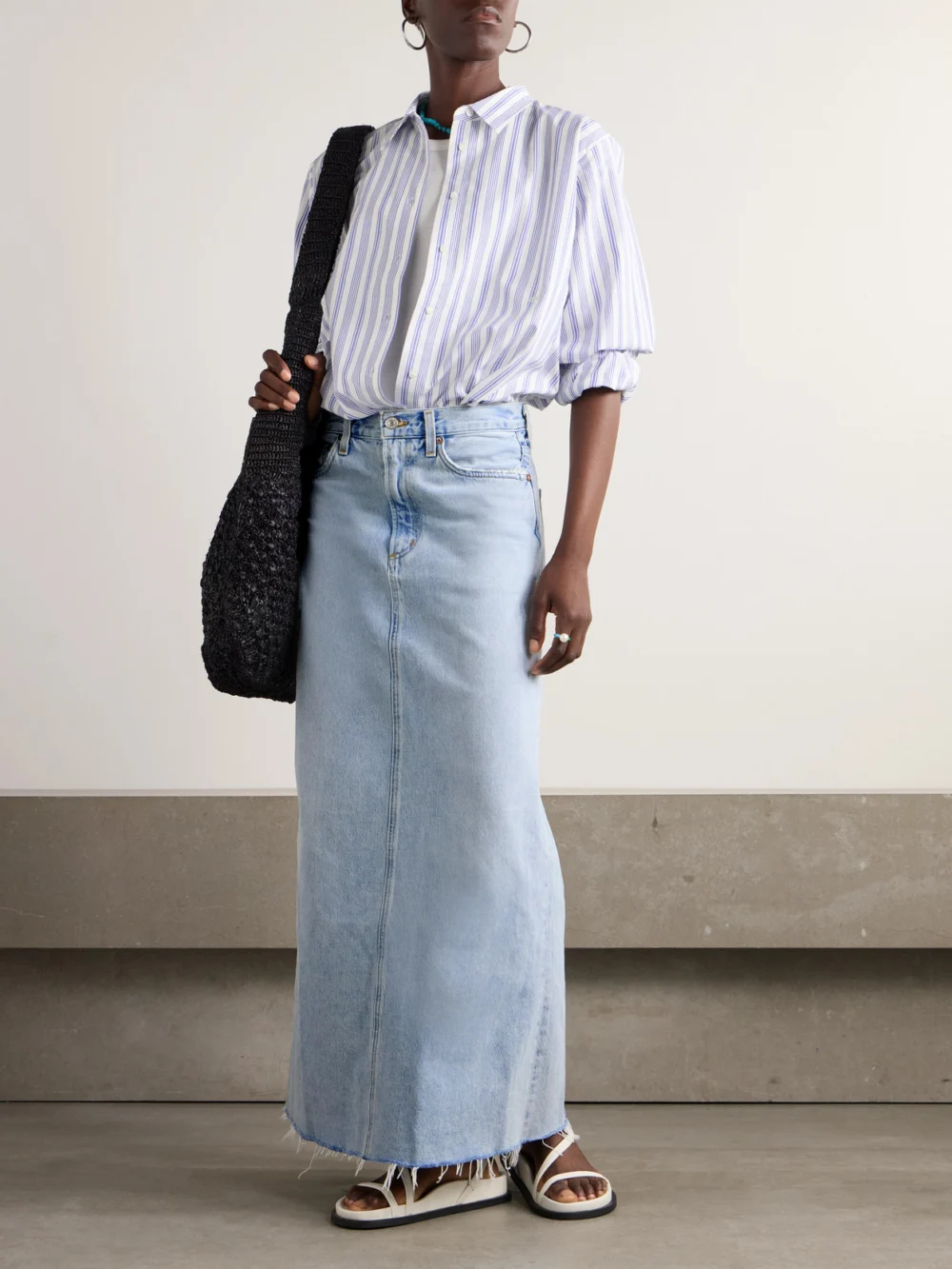 Agolde Hilla Frayed Organic Denim Maxi Skirt, worn by a model