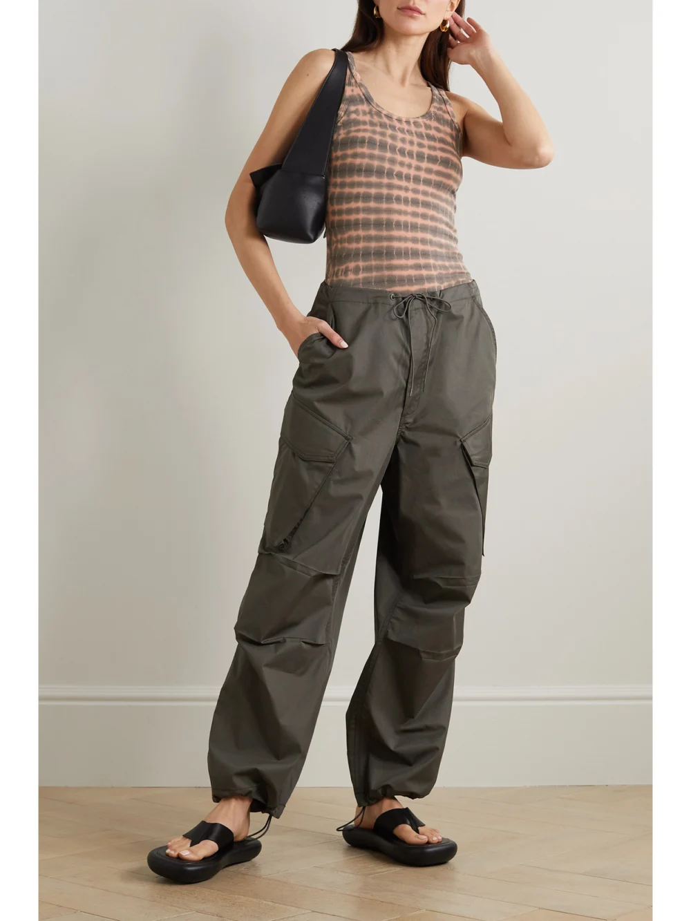 Agolde Maria Tie-dyed Ribbed Stretch-jersey Bodysuit, worn by a model