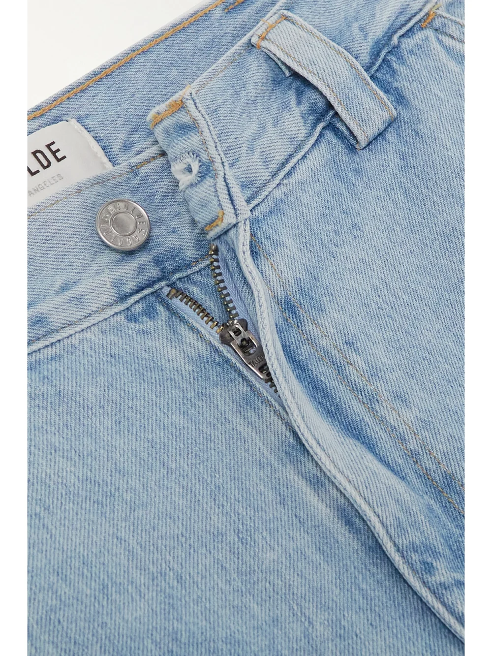 Close-up detail of the Agolde Vida Organic Denim Shorts