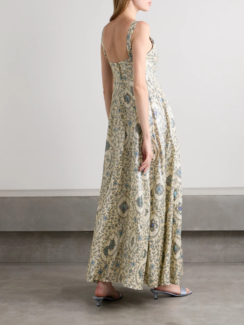 Back view of the Agua by Agua Bendita Aguamarina Platero Floral-print Linen Maxi Dress