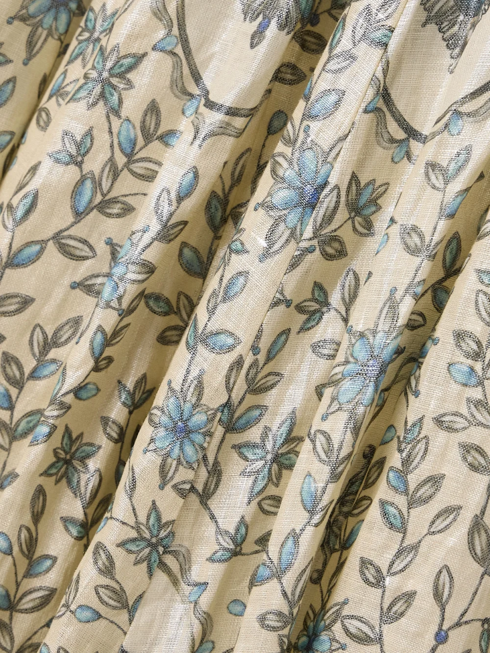 Close-up detail of the Agua by Agua Bendita Aguamarina Platero Floral-print Linen Maxi Dress