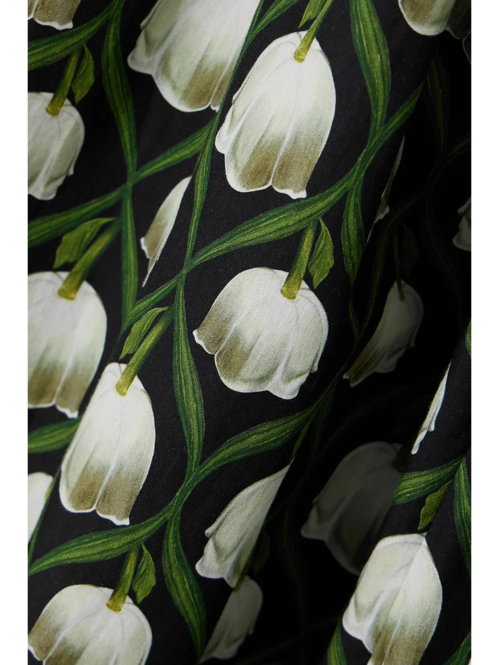 Close-up detail of the Agua by Agua Bendita Almendra Off-the-shoulder Floral-print Cotton Maxi Dress