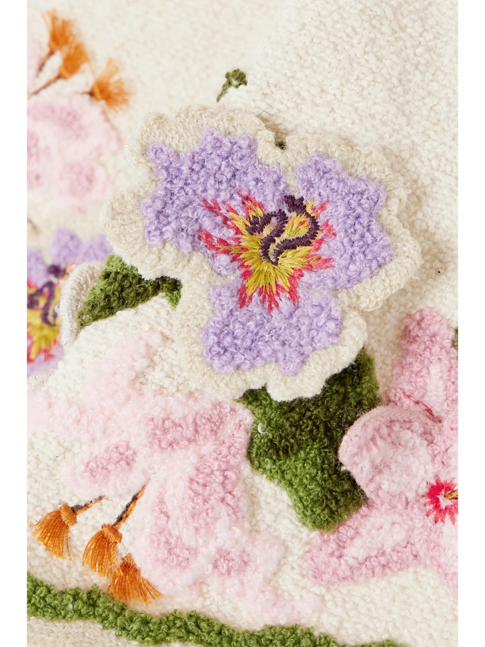 Close-up detail of the Agua by Agua Bendita Carlota Flora Cropped Appliquéd Cotton-blend Bouclé Halterneck Top