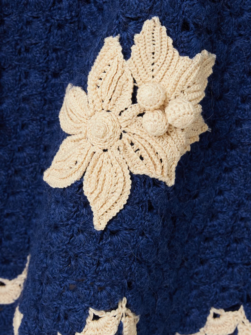 Close-up detail of the Agua by Agua Bendita + Escvdo Muhu Crocheted Alpaca Midi Skirt