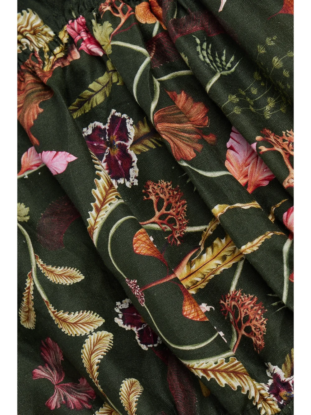 Close-up detail of the Agua by Agua Bendita Guaba Habitat Ruched Printed Linen Mini Dress