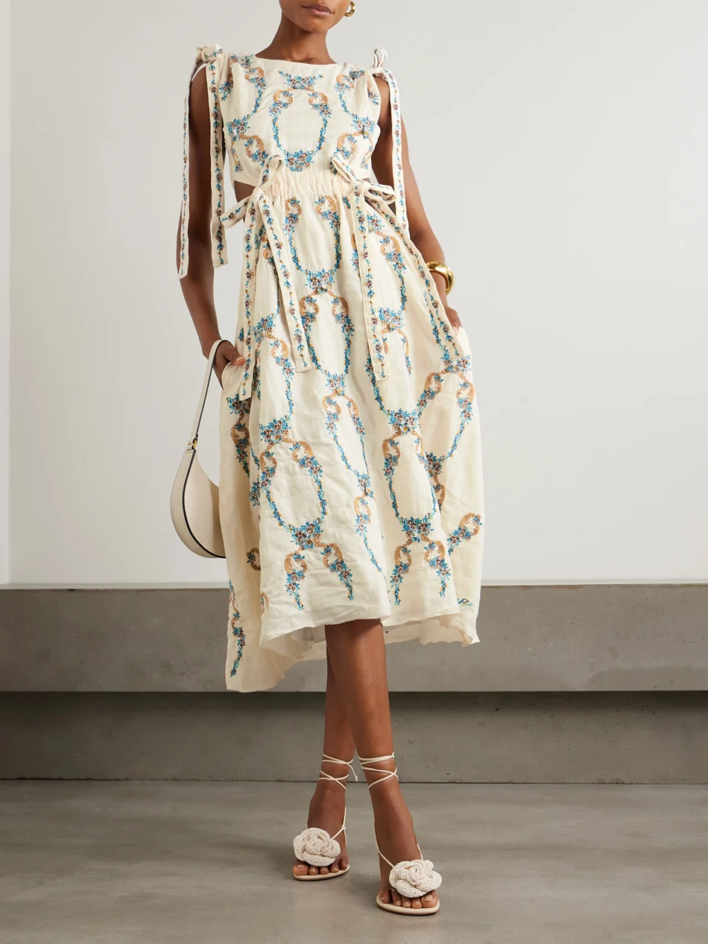 Agua by Agua Bendita Guaguancò Florero Tie-detailed Cutout Embroidered Linen Midi Dress, worn by a model