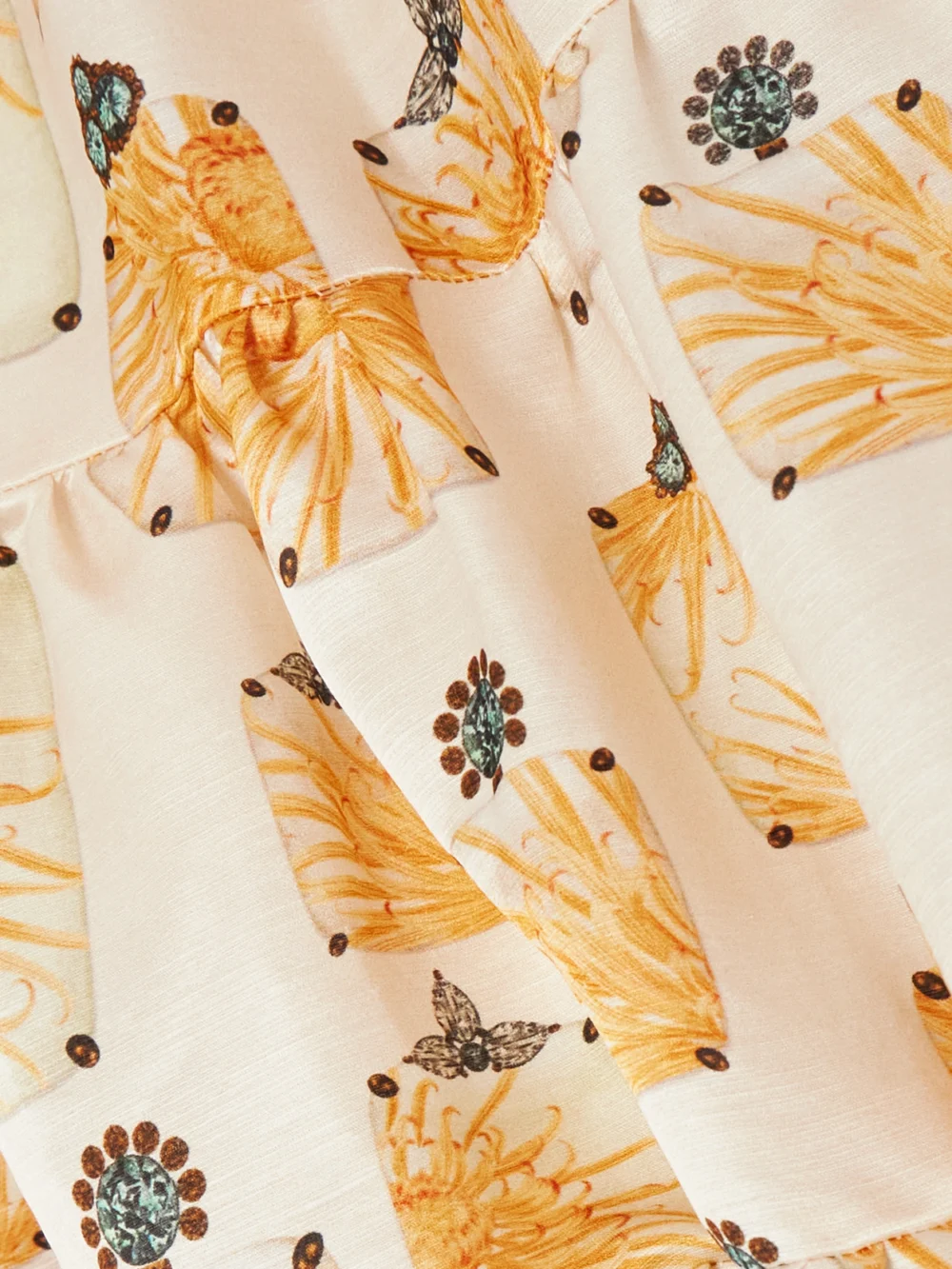 Close-up detail of the Agua by Agua Bendita Lima Tiered Printed Linen and Silk-blend Faille Mini Dress