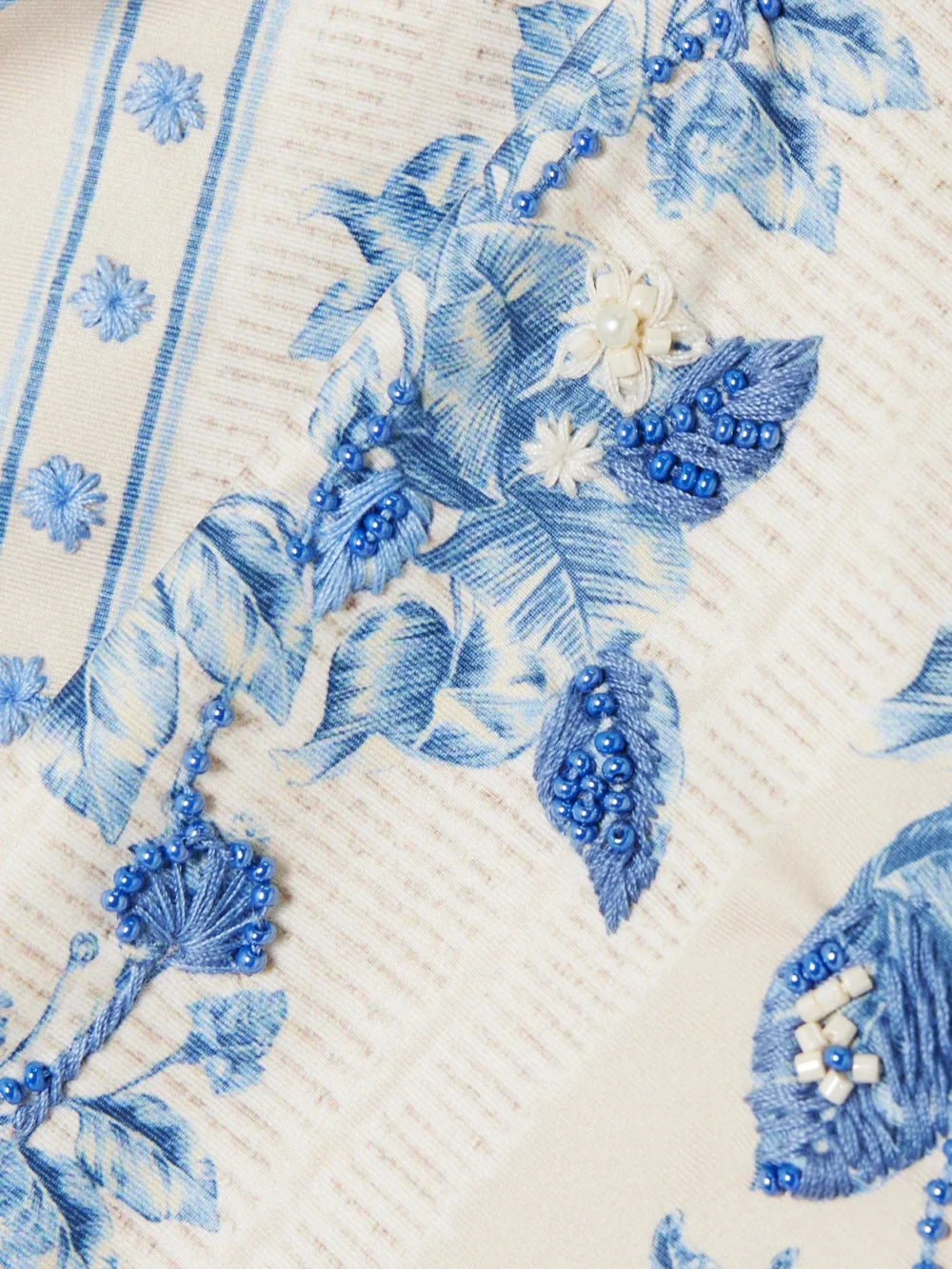 Close-up detail of the Agua by Agua Bendita Magenta Bougainvillea Bead-embellished Floral-print Recycled Bikini Bottoms