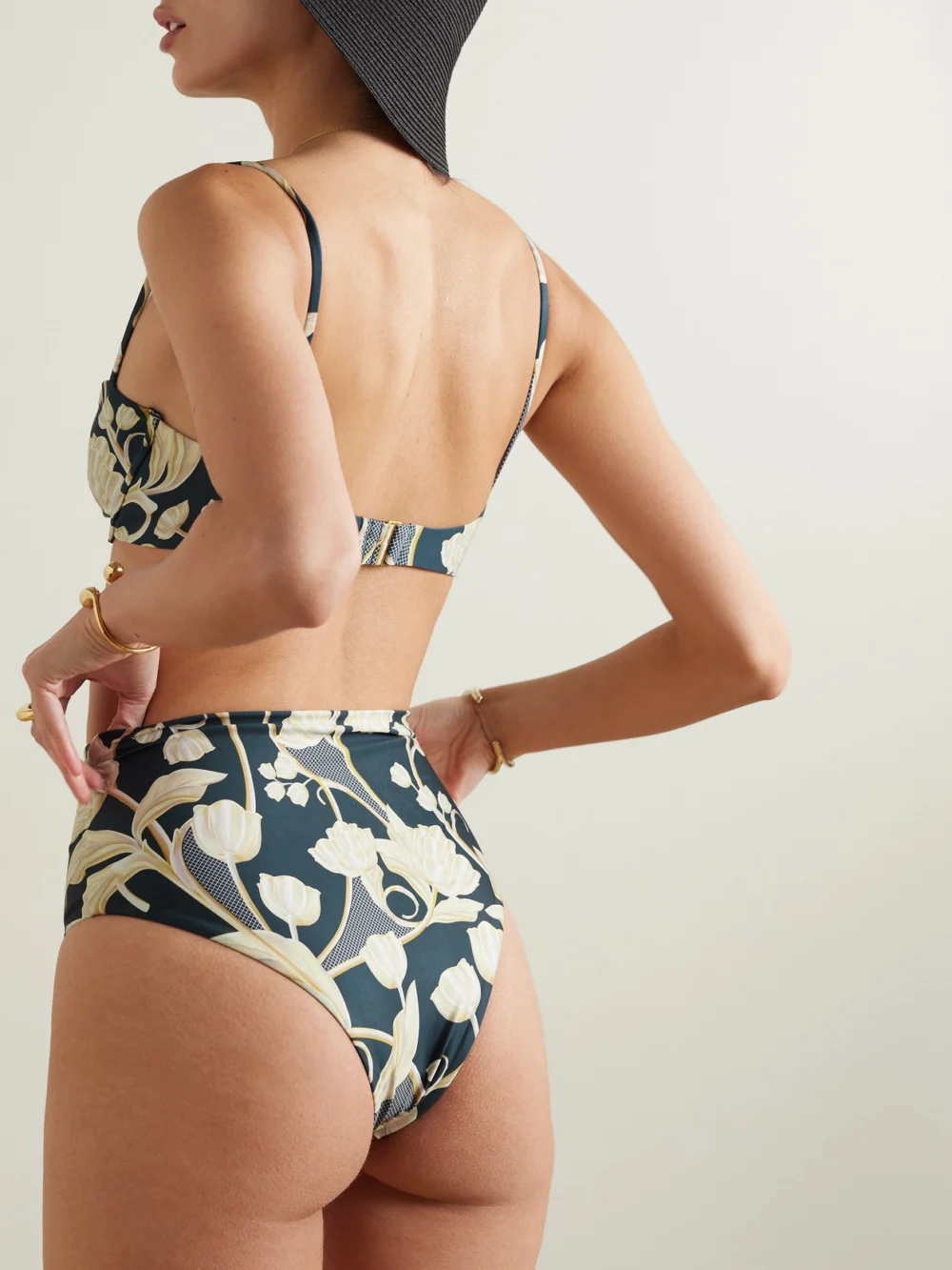 Back view of the Agua by Agua Bendita Magenta Perla Floral-print Recycled Bikini Briefs