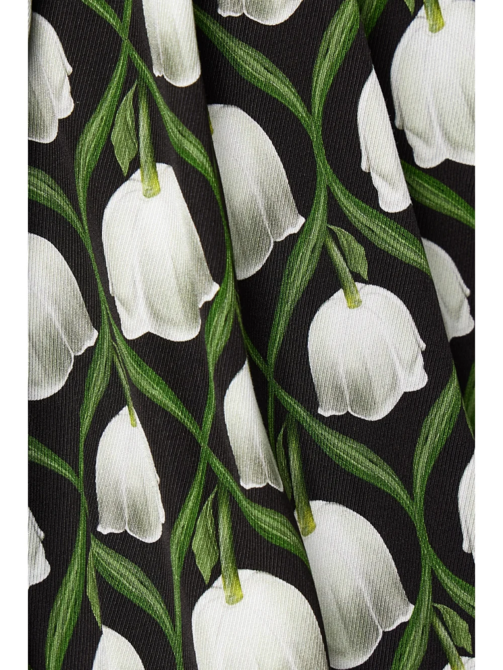 Close-up detail of the Agua by Agua Bendita Pera Perla Cropped Floral-print Recycled-twill Top