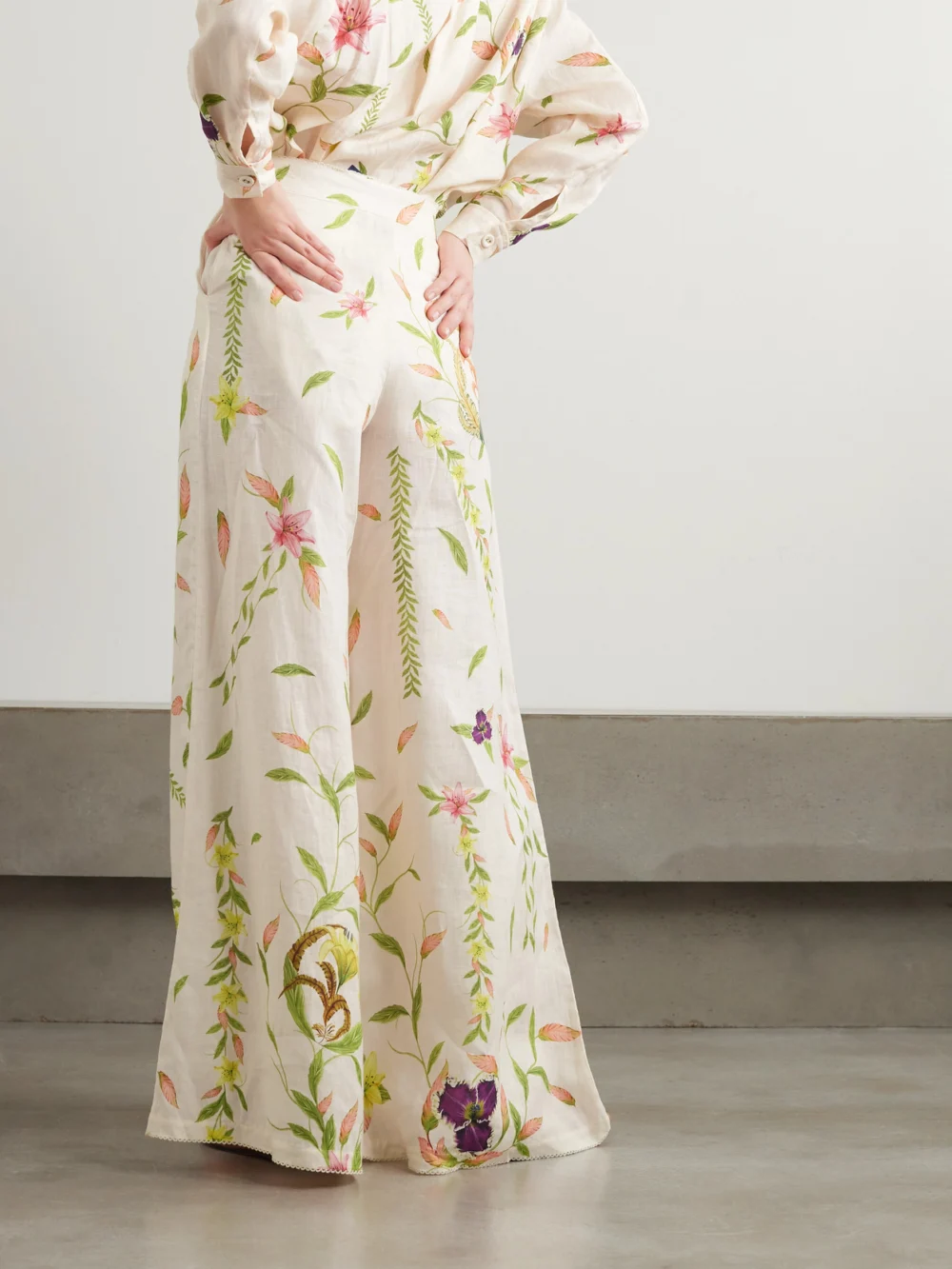 Back view of the Agua by Agua Bendita Piñon Floral-print Linen Wide-leg Pants