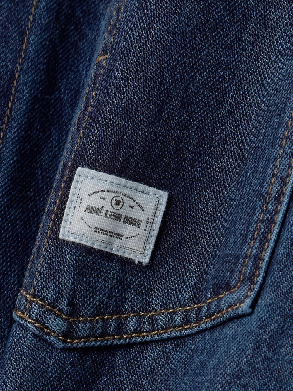 Close-up detail of the Aimé Leon Dore Corduroy-trimmed Denim Jacket