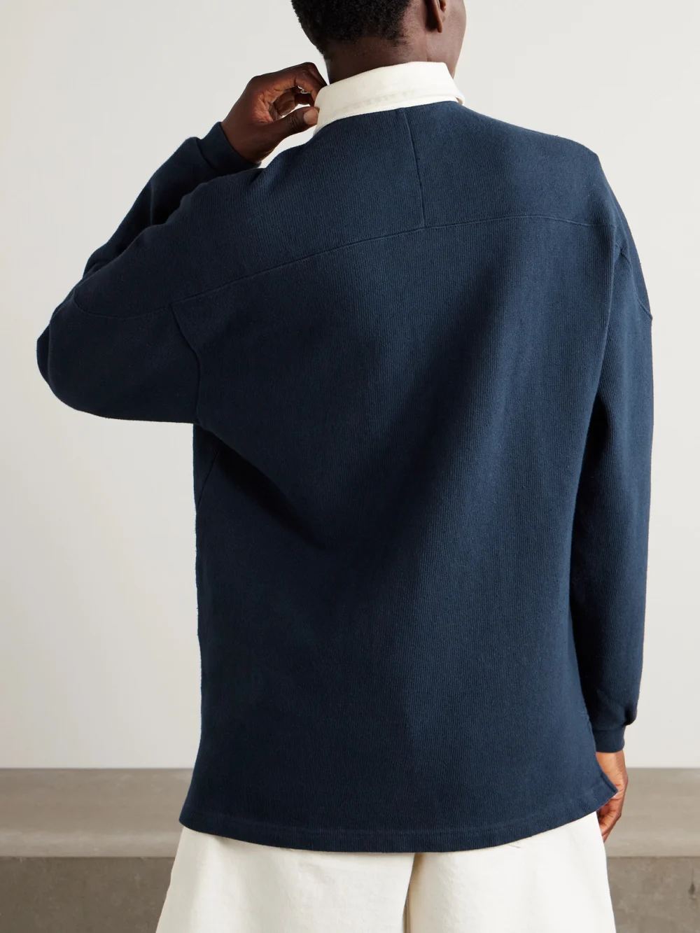 Back view of the Aimé Leon Dore Crest Embroidered Ribbed Cotton Polo Shirt