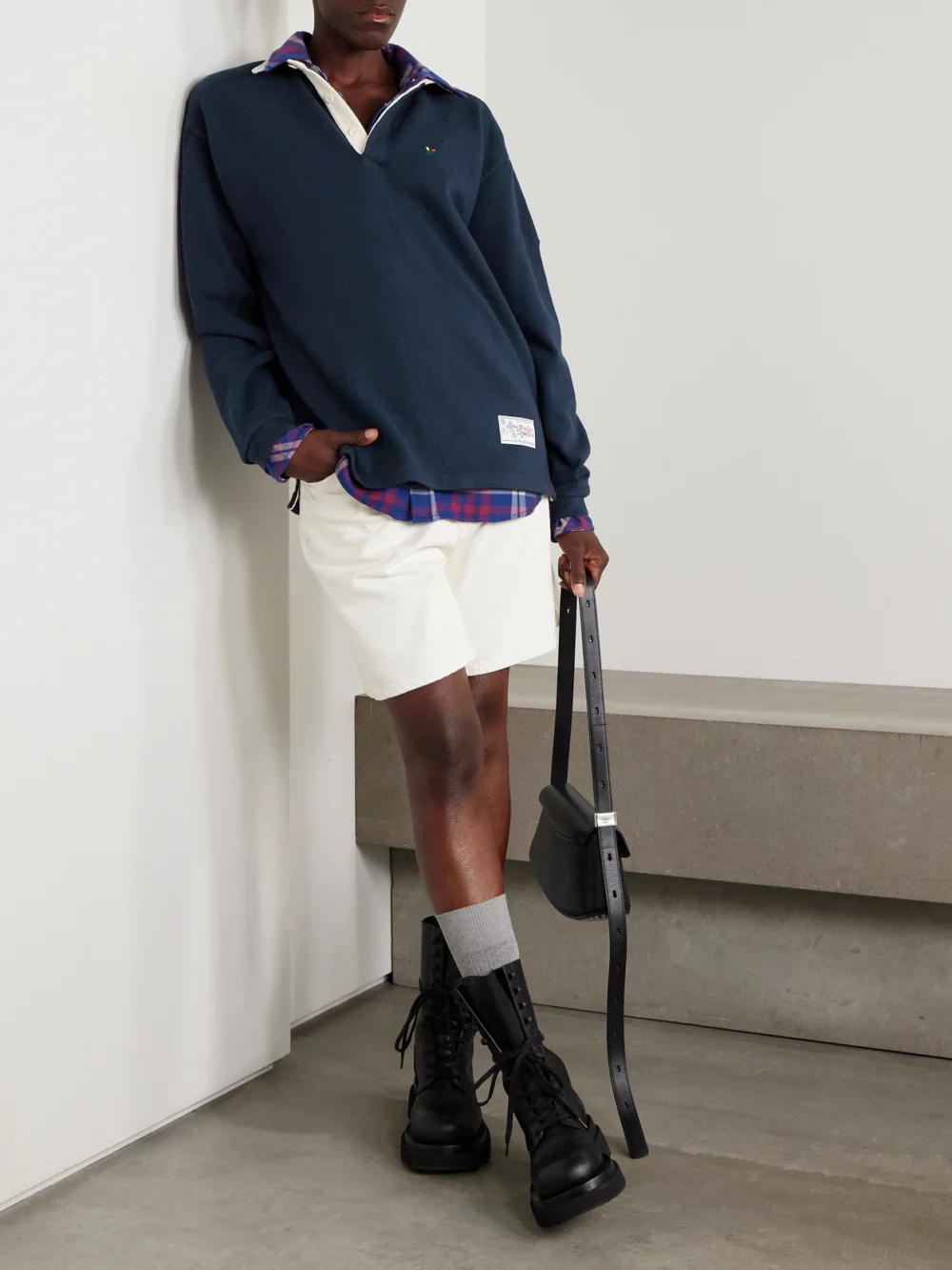 Aimé Leon Dore Crest Embroidered Ribbed Cotton Polo Shirt, worn by a model