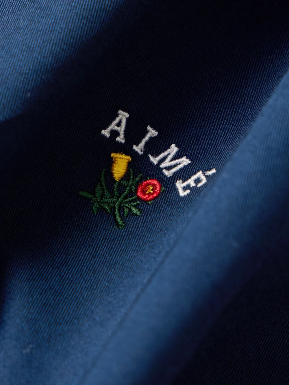Close-up detail of the Aimé Leon Dore Embroidered Cotton-twill Shirt