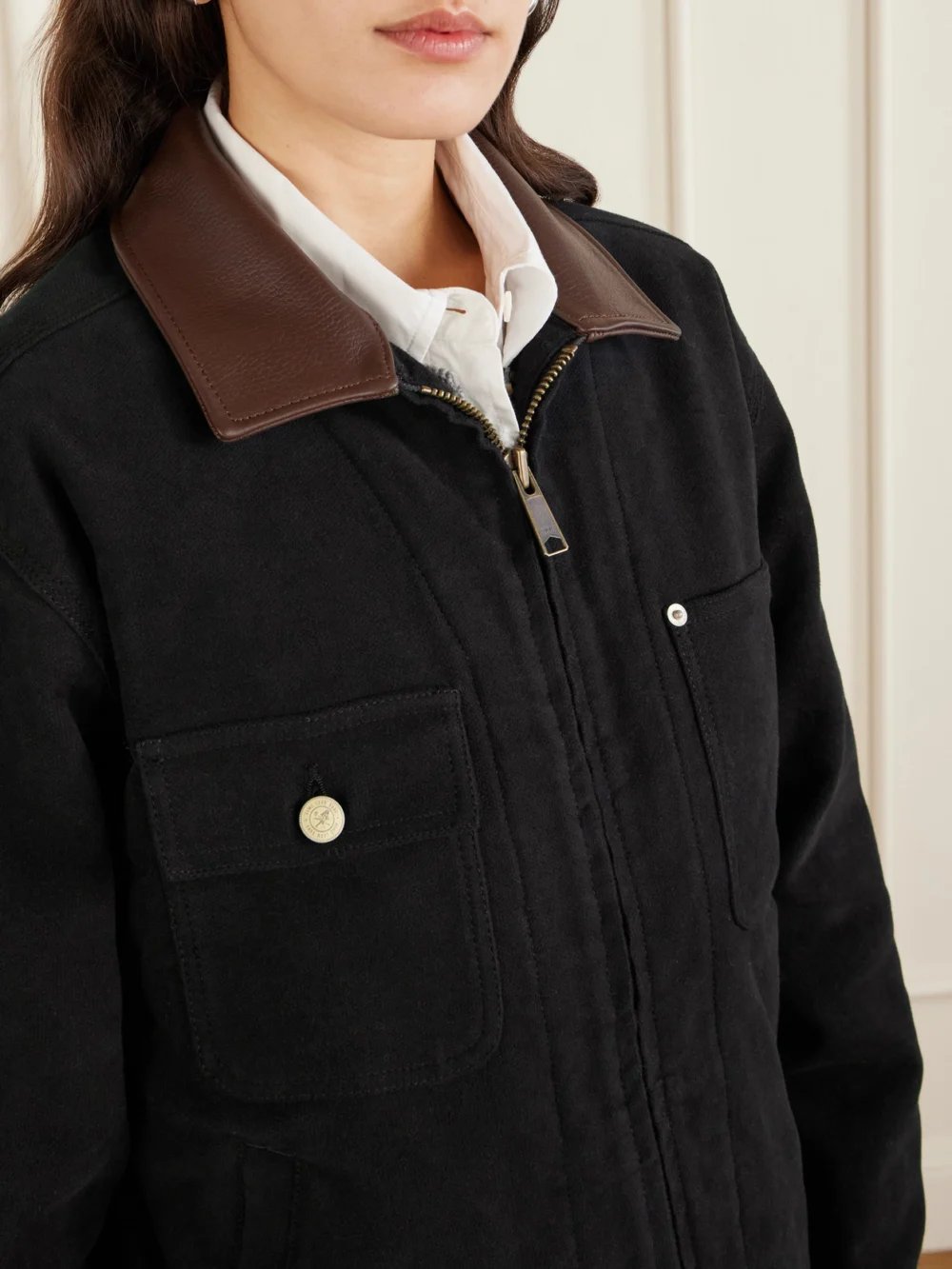 Close-up detail of the Aimé Leon Dore Ranch Leather-trimmed Cotton-canvas Jacket