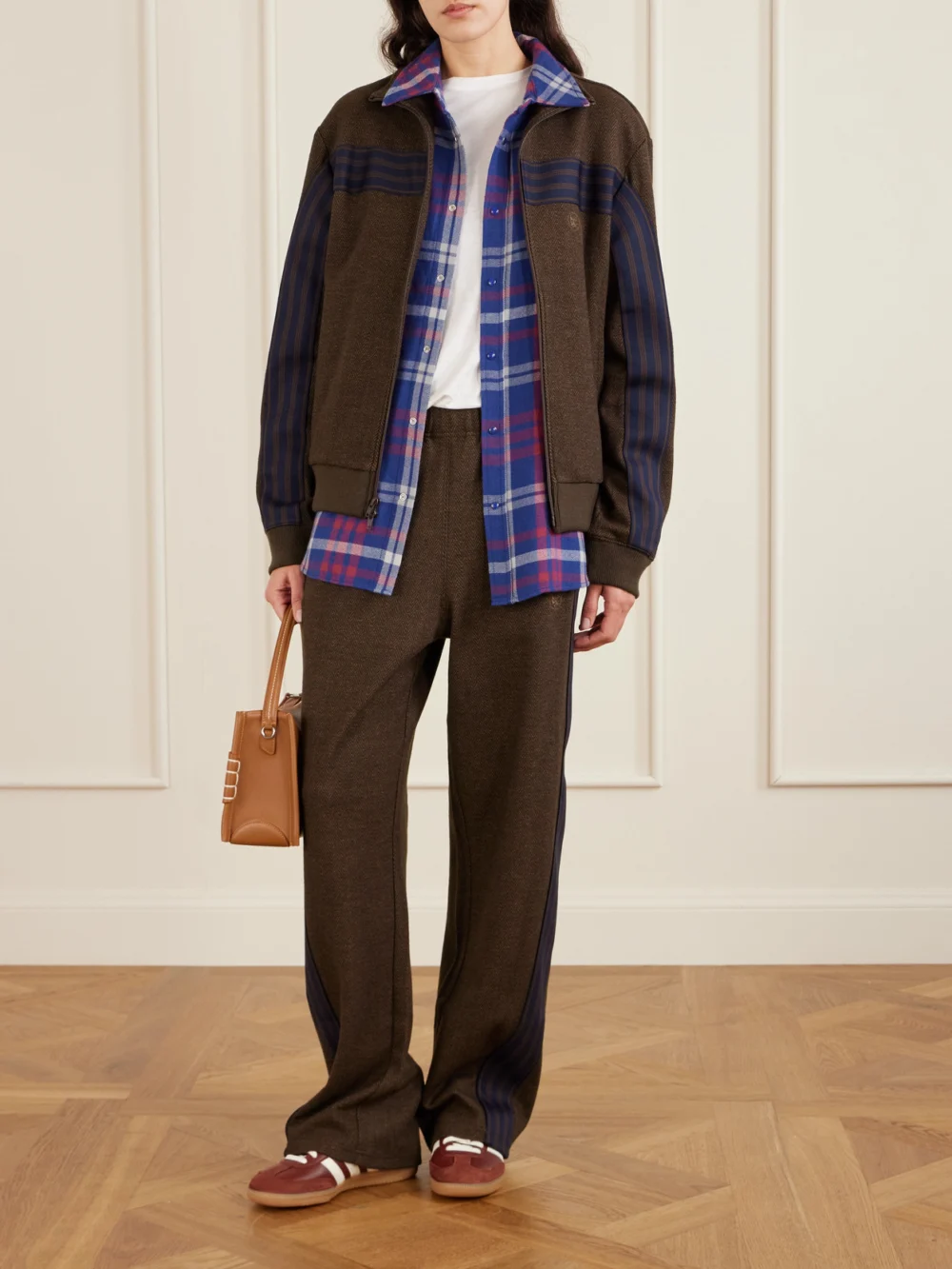 Aimé Leon Dore Striped Herringbone Wool and Cotton-blend Track Jacket, worn by a model