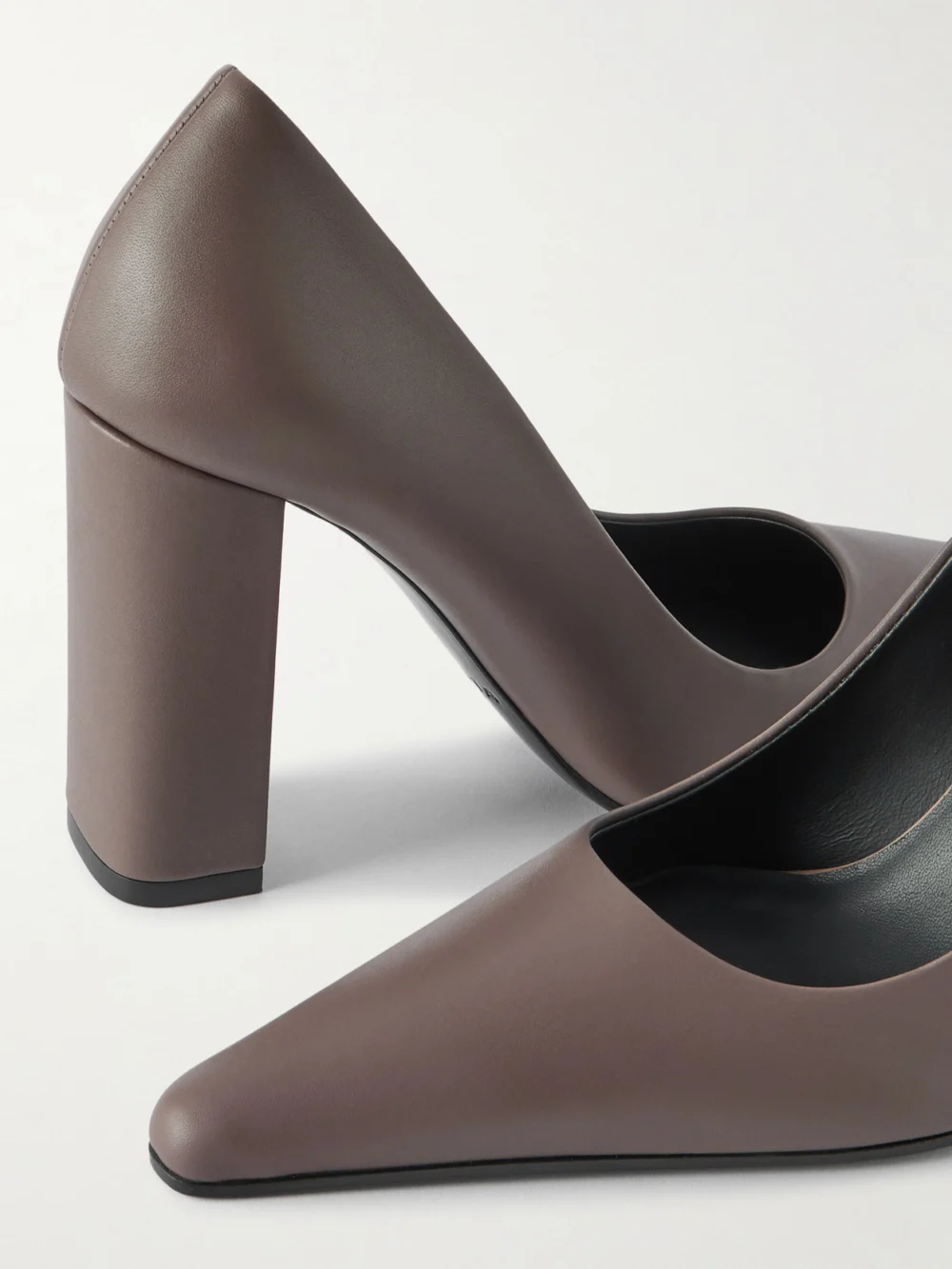 Close-up detail of the Alaïa 110 Leather Pumps