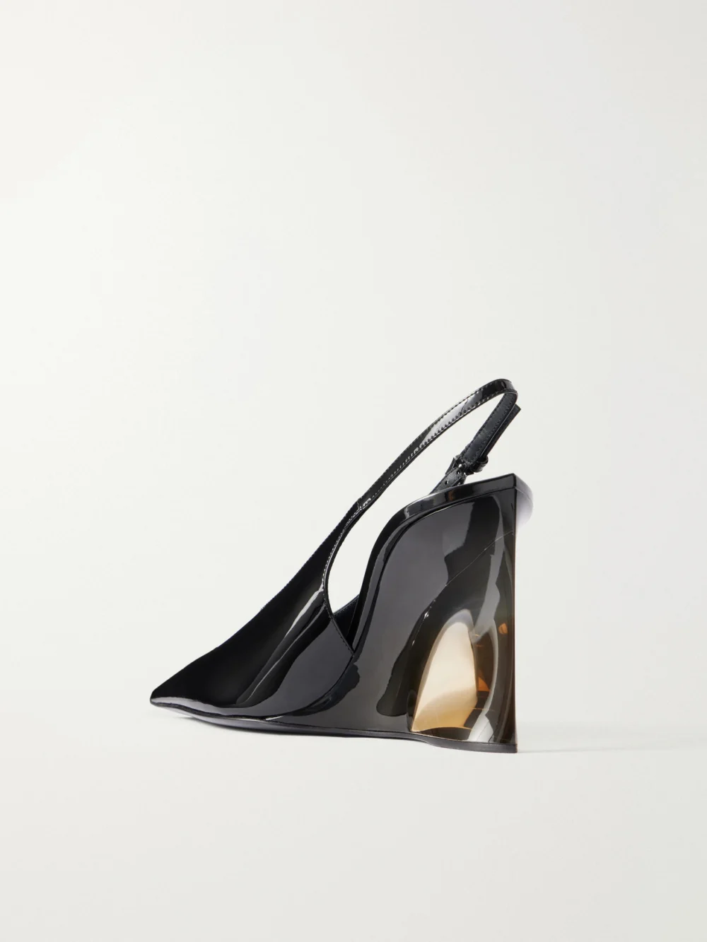 Back view of the Alaïa 110 Patent-leather Wedge Pumps