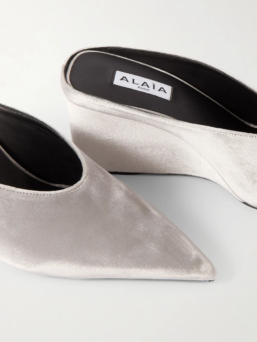 Close-up detail of the Alaïa 75 Velvet Wedge Mules