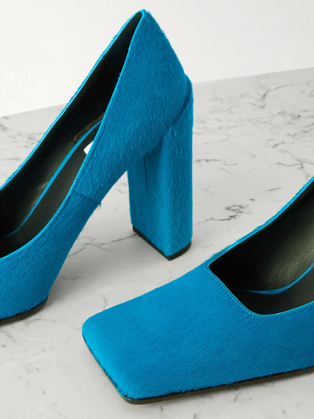 Close-up detail of the Alaïa 90 Calf Hair Pumps