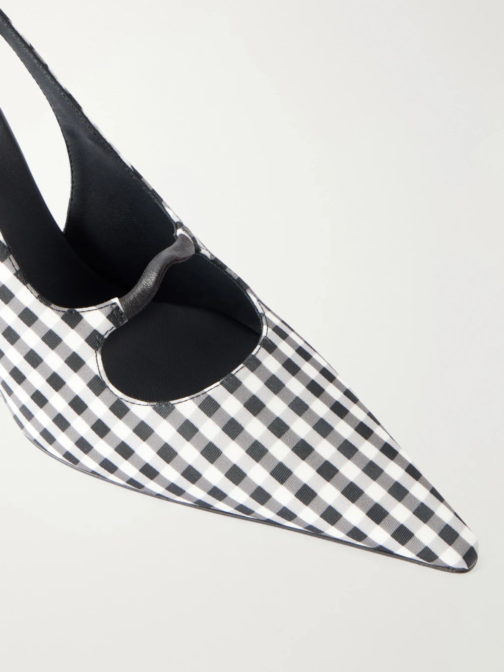 Close-up detail of the Alaïa 90 Checked Leather-trimmed Canvas Slingback Pumps