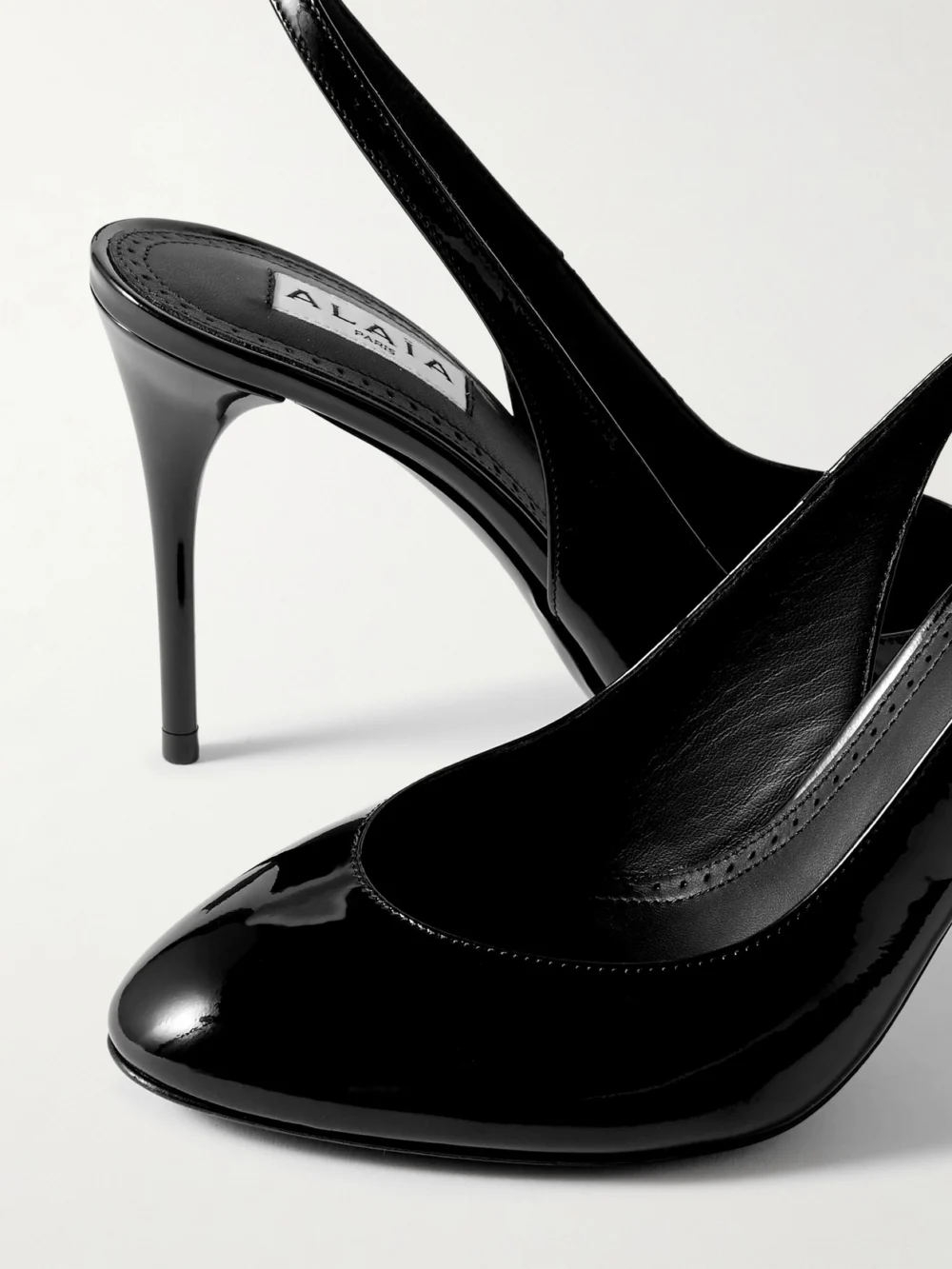 Close-up detail of the Alaïa 90 Patent-leather Pumps