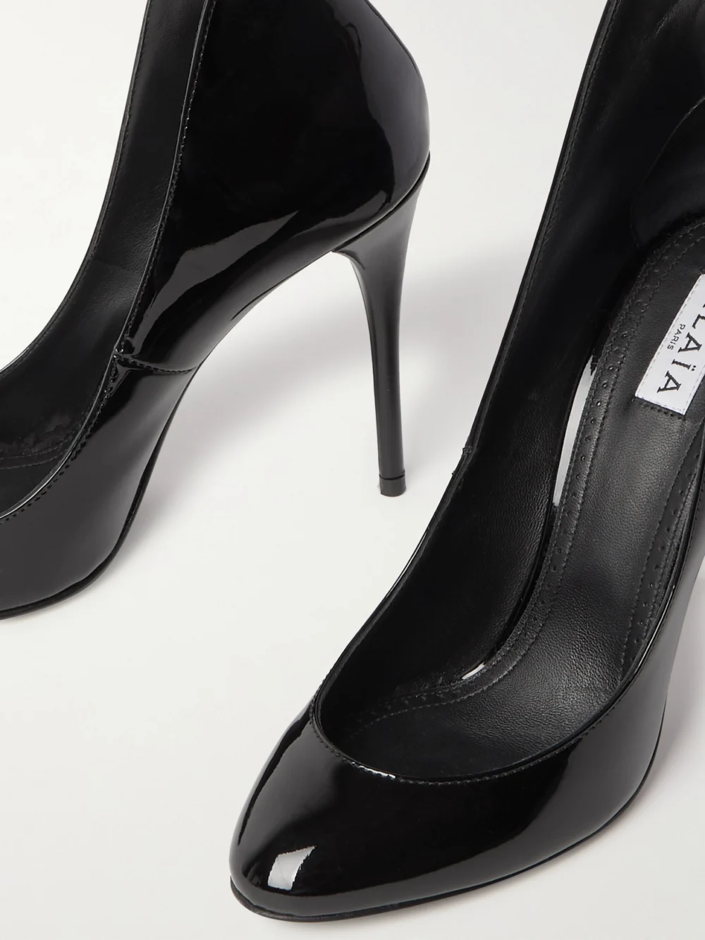 Close-up detail of the Alaïa 90 Patent-leather Pumps