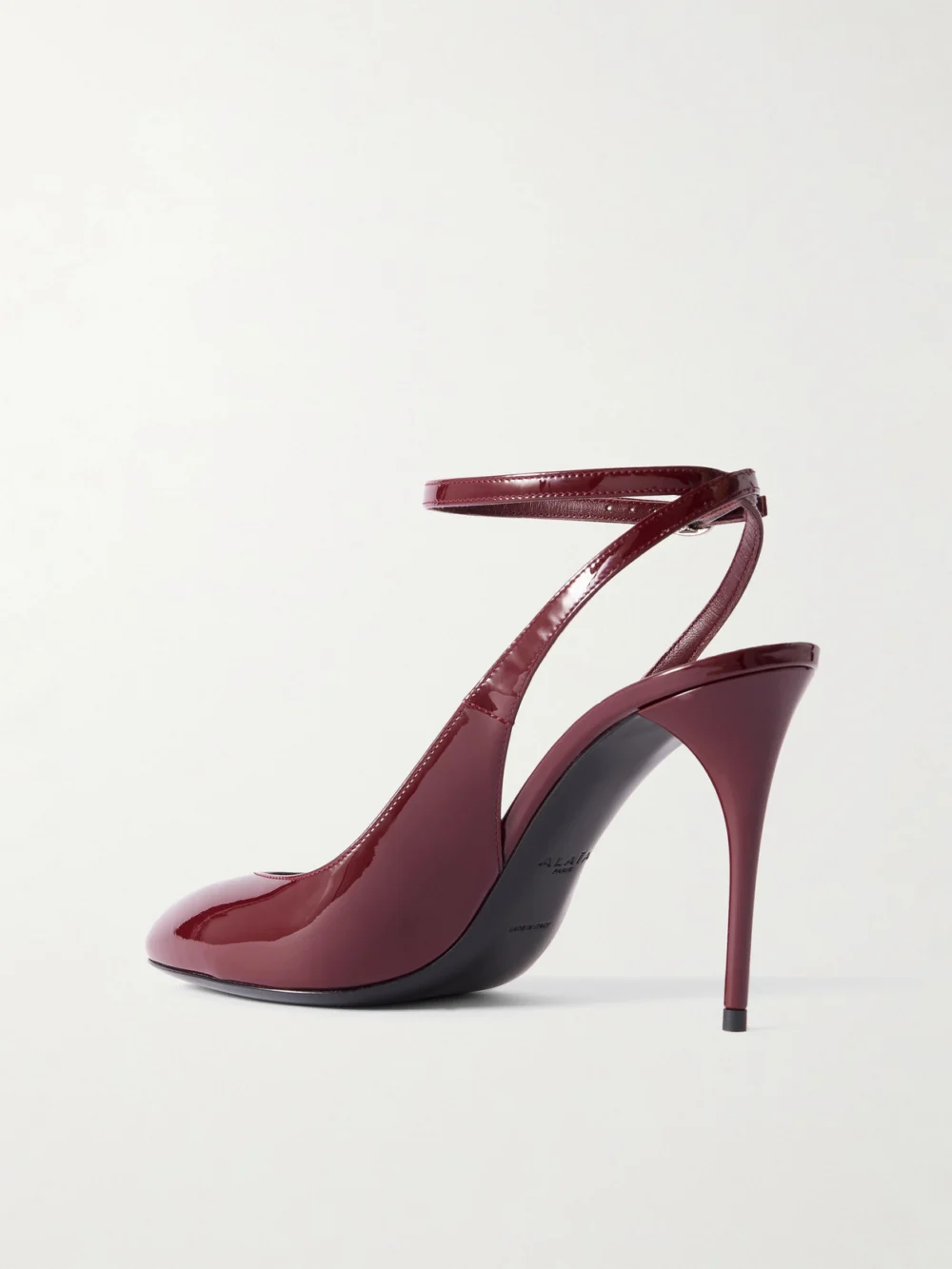 Back view of the Alaïa 90 Patent-leather Pumps