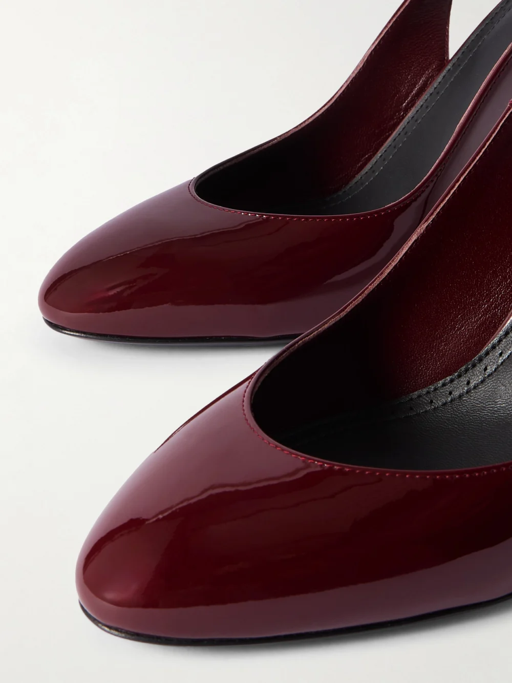 Close-up detail of the Alaïa 90 Patent-leather Pumps