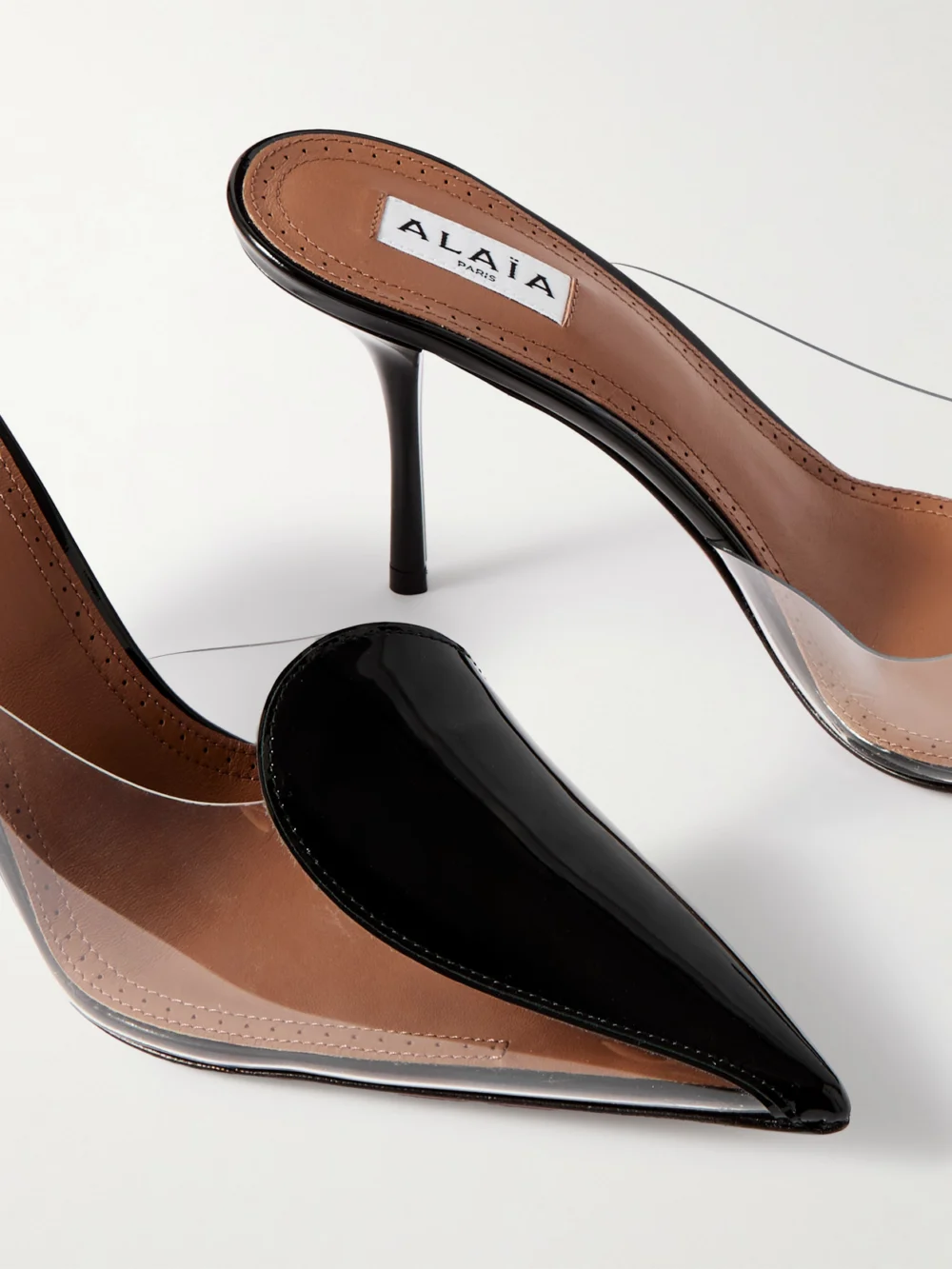Close-up detail of the Alaïa 90 Pvc and Patent-leather Mules