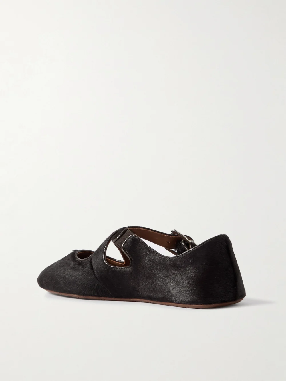 Back view of the Alaïa Criss Cross Leather-trimmed Calf Hair Ballet Flats