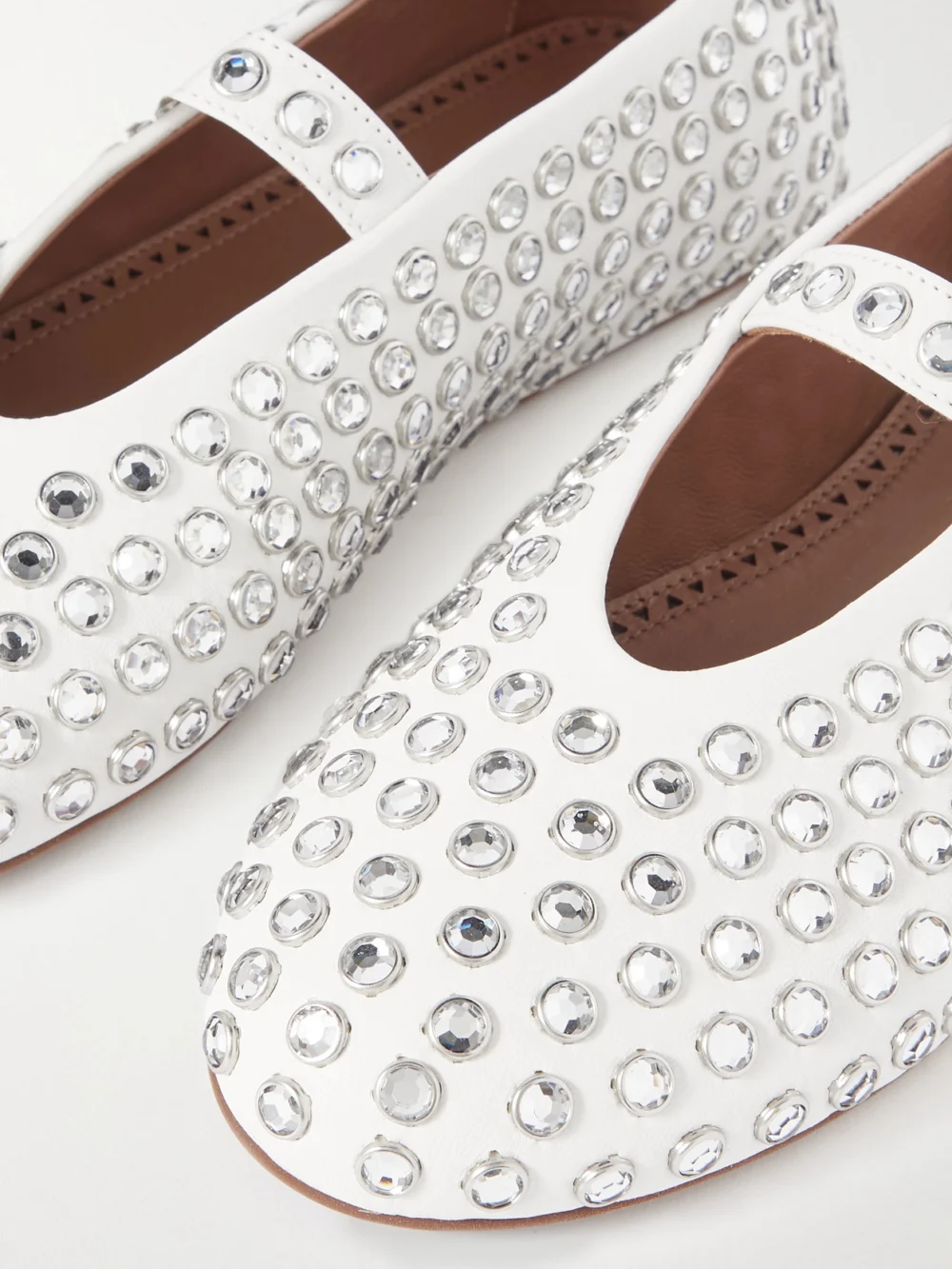 Close-up detail of the Alaïa Crystal-embellished Leather Ballet Flats