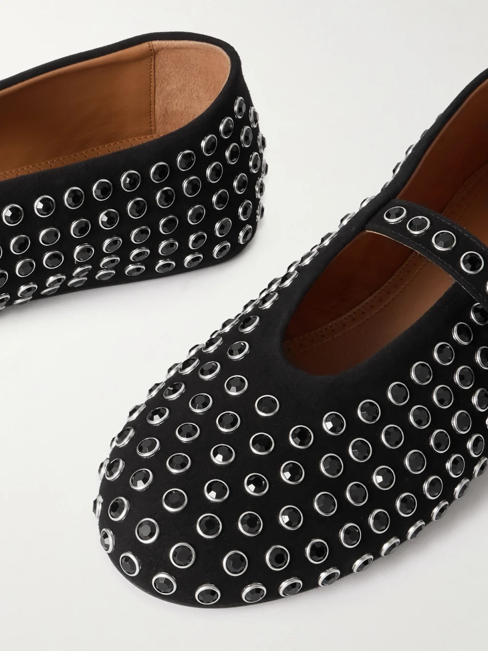 Close-up detail of the Alaïa Crystal-embellished Suede Ballet Flats