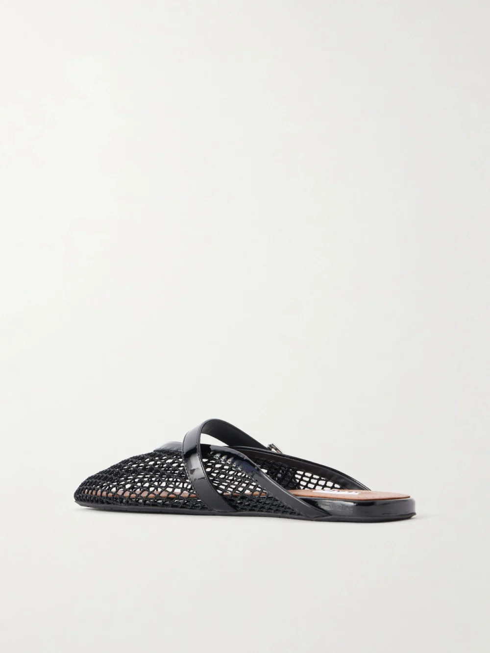 Back view of the Alaïa Fishnet Flat Mules