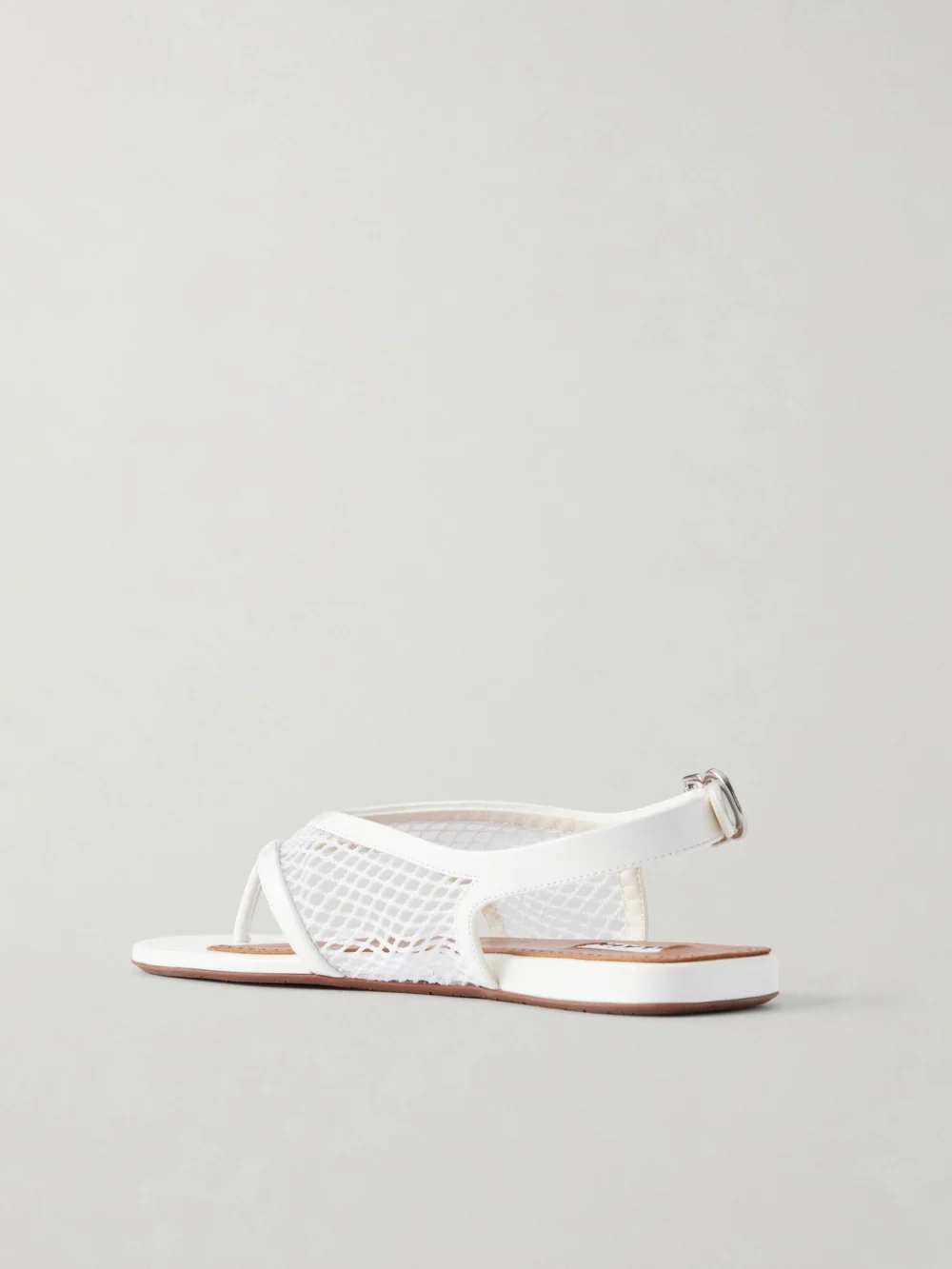 Back view of the Alaïa Fishnet Flat Sandals
