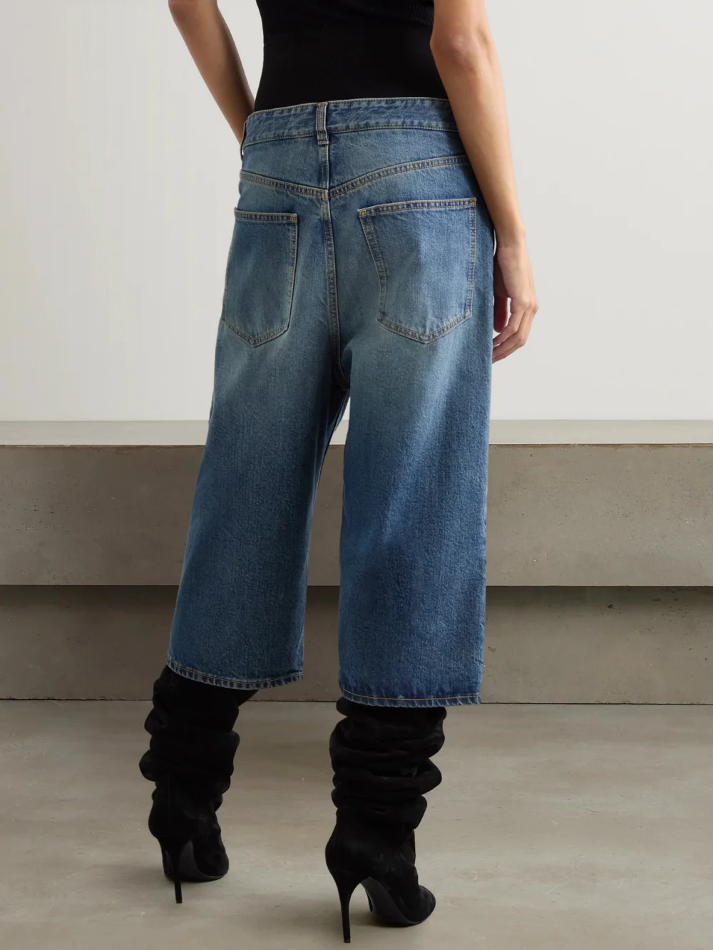 Back view of the Alaïa Jersey-trimmed Denim Shorts